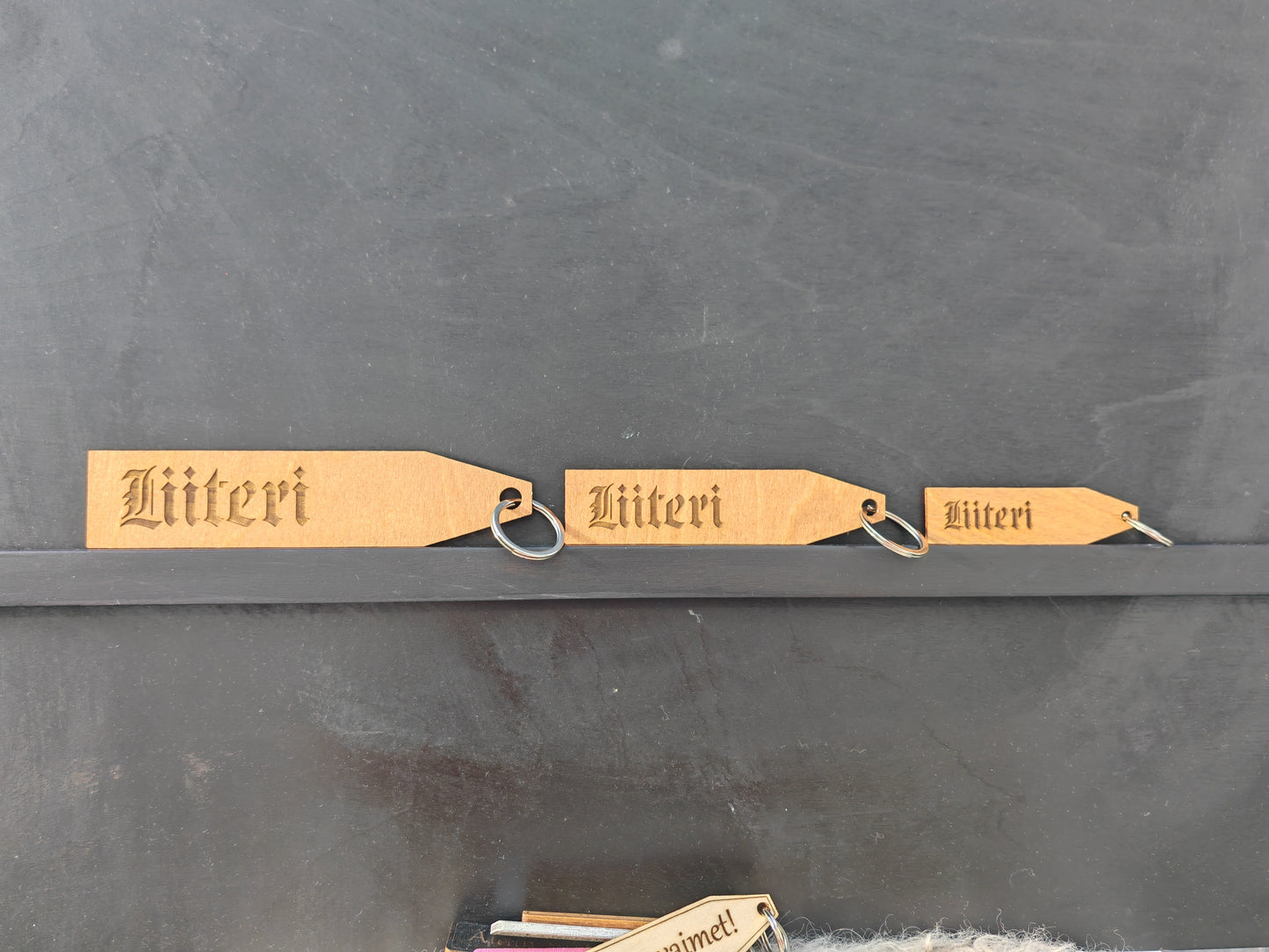 Old fashioned wood key chain with key ring