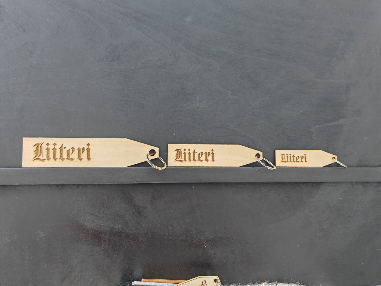 Old fashioned wood key chain with key ring