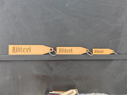 Old fashioned wood key chain with key ring